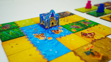 Kingdomino terrain tiles and castle during play