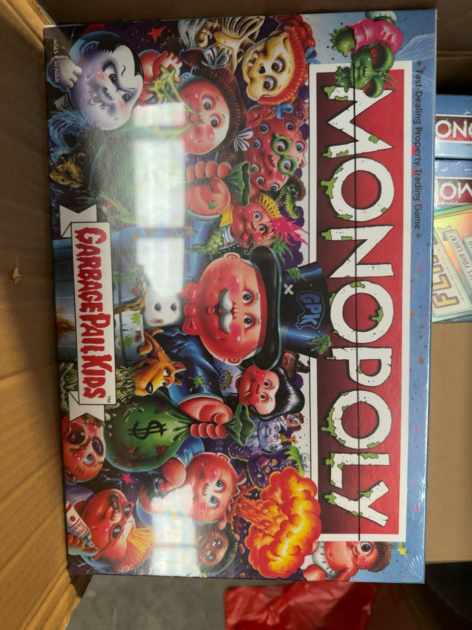 Boxed MONOPOLY Garbage Pail Kids Edition photographed in stock