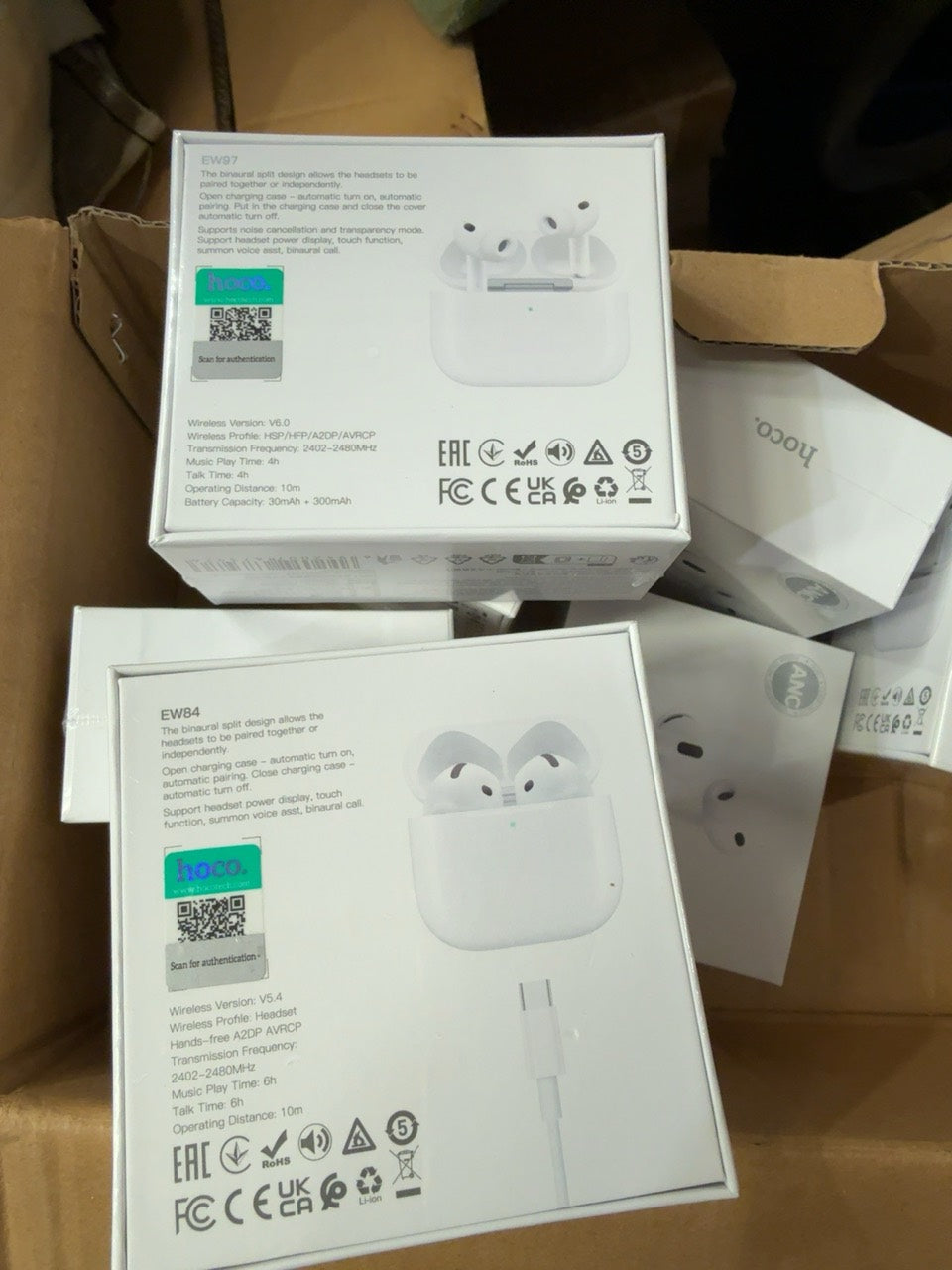 Hoco EW97 photographed retail packaging with other separately sold Hoco models