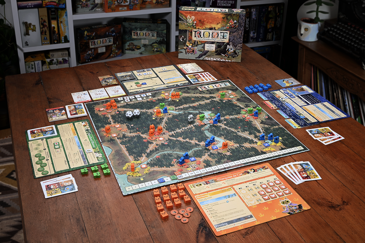 Root base game setup and box — official Leder Games photograph